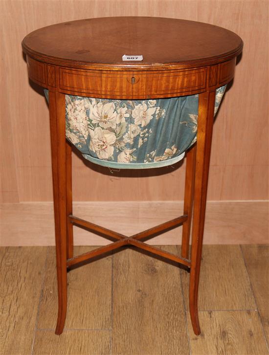 An Edwardian inlaid satinwood work table, W.1ft 7in. D.1ft 2in. H.2ft 5in.